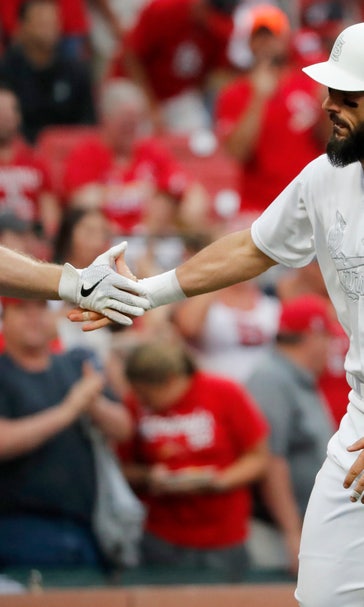 Carpenter snaps out of slump as Cards sweep Rockies, 11-4